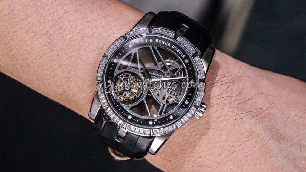 Collector examining super clone watch under magnifier during authenticity check